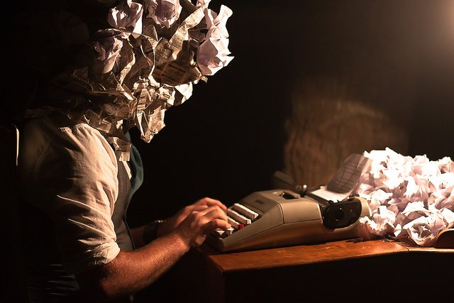crumpled-paper-head-writer-with-typewriter-by-Dr
