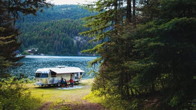 International-Serenity-Travel-Trailers-2018-camping-by-the-lake-700x0-c-default.jpg