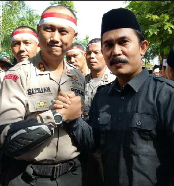 https://s3.us-east-2.amazonaws.com/partiko.io/img/dheaagustina-kunjungan-kapolres-aceh-utara-kerumah-adat-1533381656319.png