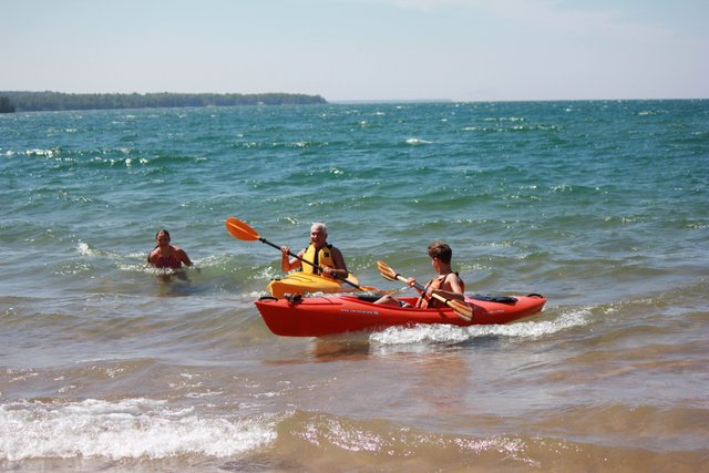 https://s3.us-east-2.amazonaws.com/partiko.io/img/offgridlife-photography-practicing-kayaking-in-the-waves-on-gitchee-gumee-cds4spon-1537179666252.png