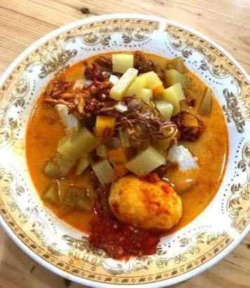 https://s3.us-east-2.amazonaws.com/partiko.io/img/pakhusaini-lontong-aceh-1530963493939.png