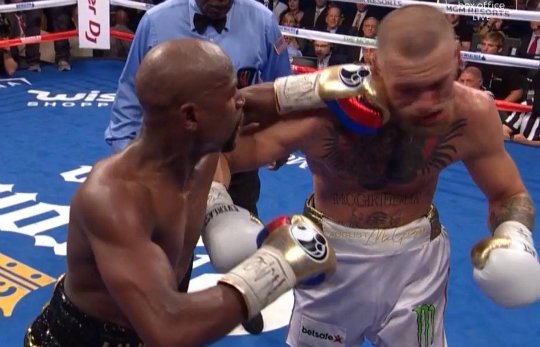 Mayweather_vs_Mcgregor_left_hook_round_10_rz540.jpg