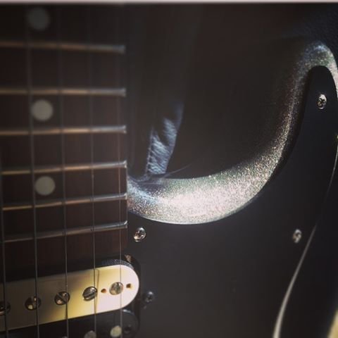Silver Sparkle Charvel and some shadows