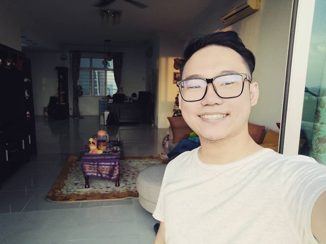 Image may contain: Isaac Tan, smiling, eyeglasses