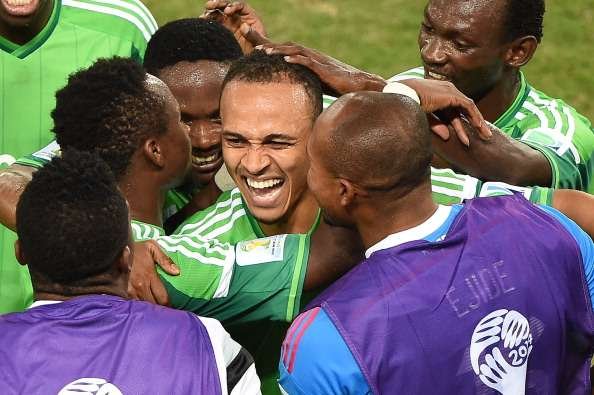 1554377962_peter-odemwingie-juwon-oshaniwa-nigeria-2014-world-cup-group-f-06222014_1hplpwiwb0j61i3r8l21x58sm.jpg