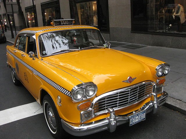 640px-Old_checker_cab (1).jpg