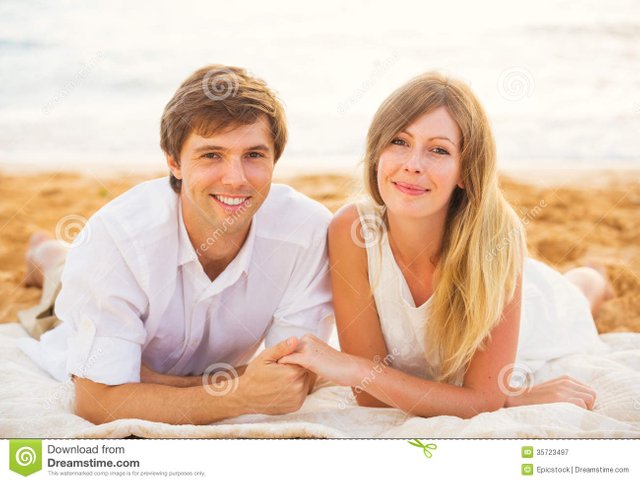 young-couple-love-man-woman-enjoying-romantic-afternoon-women-sunset-beach-35723497.jpg