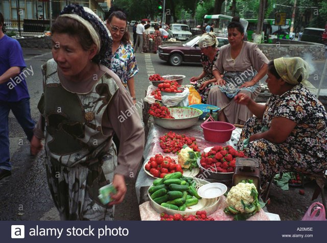 selling-vegetables-in-a-market-in-tashkent-one-of-the-cities-on-the-A20M5E.jpg