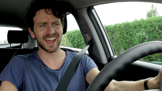 cool-happy-man-singing-in-car-while-driving-4k_h_gv7tsu__F0009.png