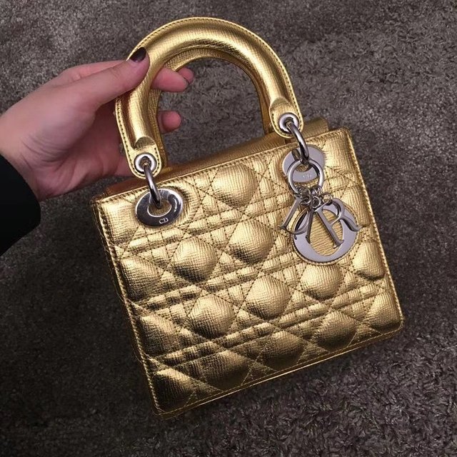 Gold christian 2024 dior bag