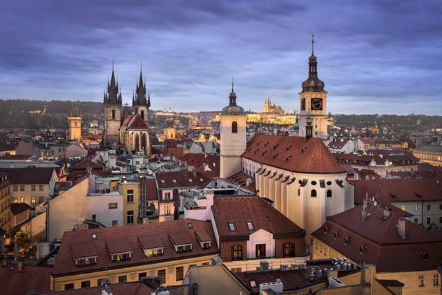 Aerial-View-of-Church-of-Our-Lady-before-Tyn-Old-Town-and-Prague-Castle-in-the-Evening-Prague-Czech-Republic.jpg