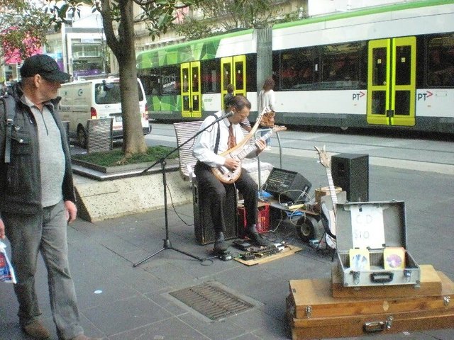 musician on the street_resized-816x612.jpg