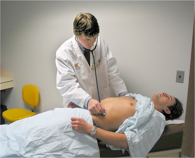Standardized-Patient-Program-examining-t_he-abdomen.jpg