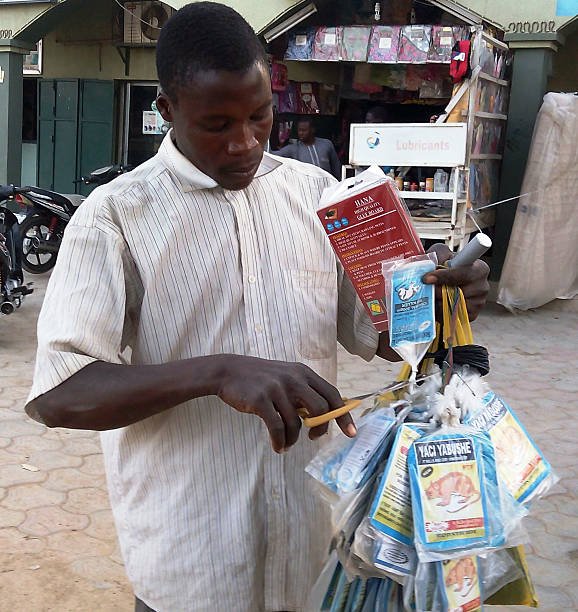 vendor-sells-bags-of-rat-poison-in-northern-nigerias-largest-city-of-picture-id506679570.jpeg