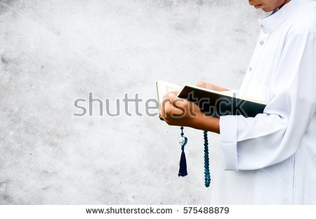 stock-photo-muslim-child-reading-a-book-on-gradient-background-in-islam-study-575488879.jpg