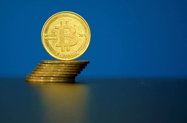 file-photo-bitcoin-virtual-currency-coins-are-seen-in-an-illustration-picture-taken-at-la-maison-du-bitcoin-in-paris-france-may-27-2015-reuters-benoit-tessier-file-photo.jpg