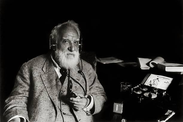 alexander-graham-bell-using-radiophone-picture-id73846041-1.jpg