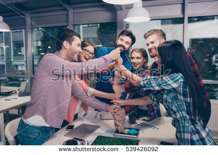 stock-photo-happy-businesspeople-putting-their-fist-on-top-of-each-other-and-laughing-they-have-training-539426092.jpg