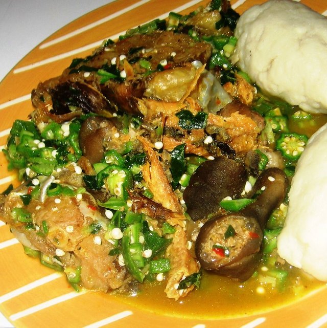 okro soup with goatmeat and stockfish served with pounded yam.jpg