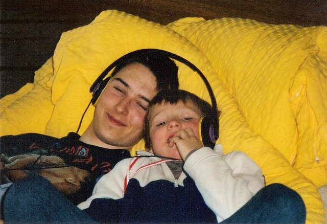 Brothers listening to music