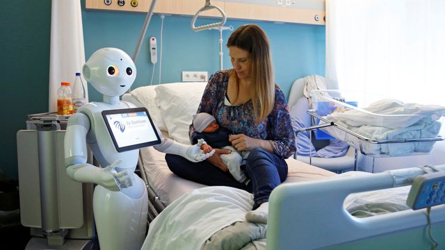 An AI medical support robot-helping-baby.jpg