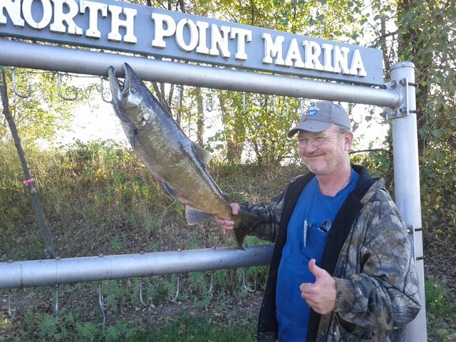 10-06-2011 Dave with King Salmon caught at Kenosha, WI.jpg