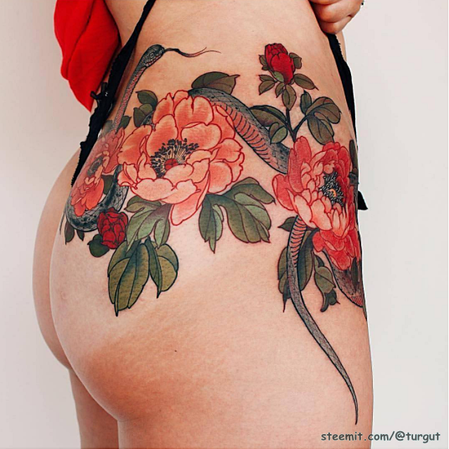 Small lotus flower tattoo on the bottom