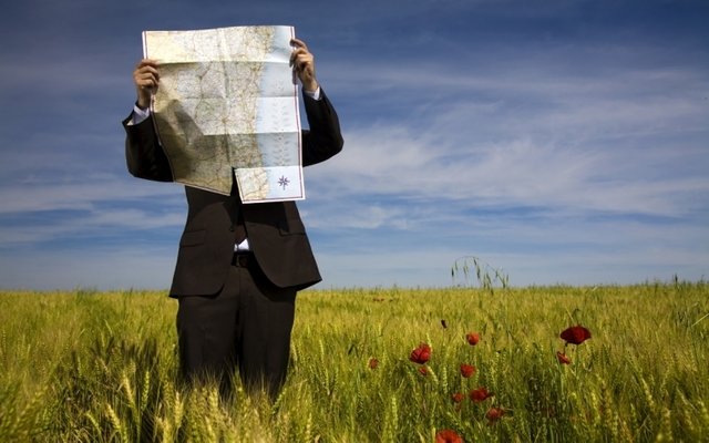 businessman-reading-map-ftr.jpg