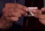 fingers on bill folding 00:18.png