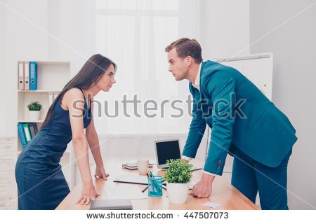 stock-photo-business-competition-two-colleagues-having-disagreement-and-conflict-447507073.jpg