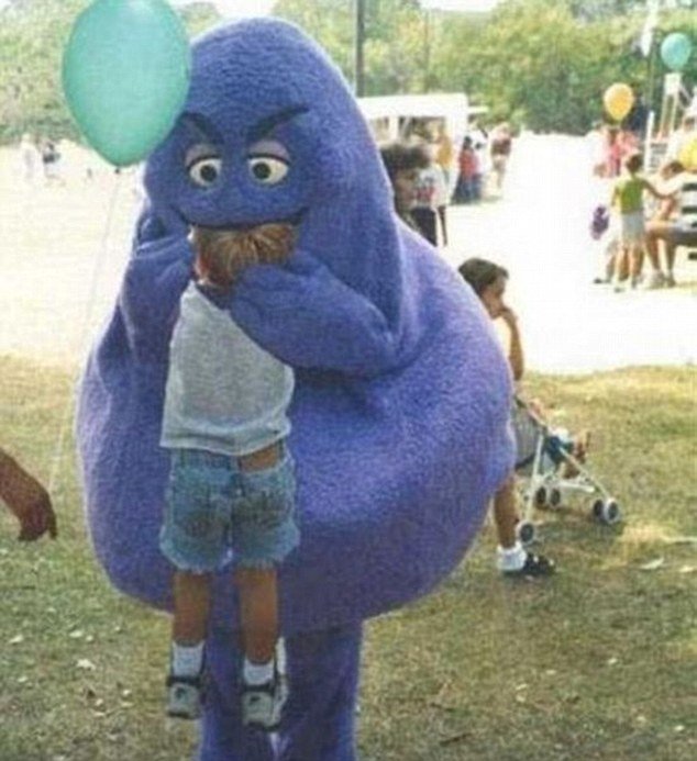 grimace-costume-eating-child.jpg