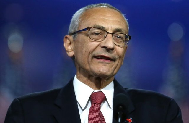 podesta grin.jpeg