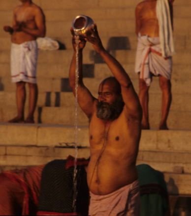 India - Varanasi - Ritual Prayer by the Ganges.jpg