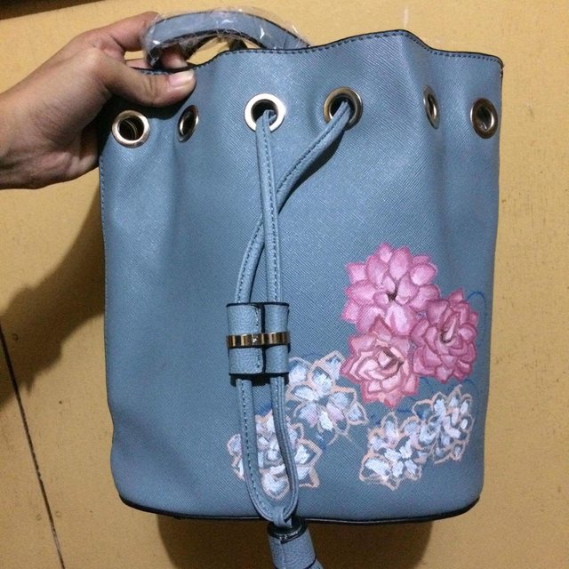 acrylic paint on leather bag