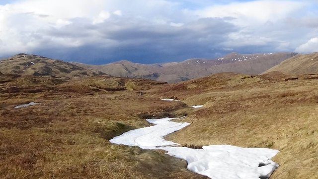 57 Snow-covered river on marsh back from Heasgarnich - gorgeous ochres and blues.jpg