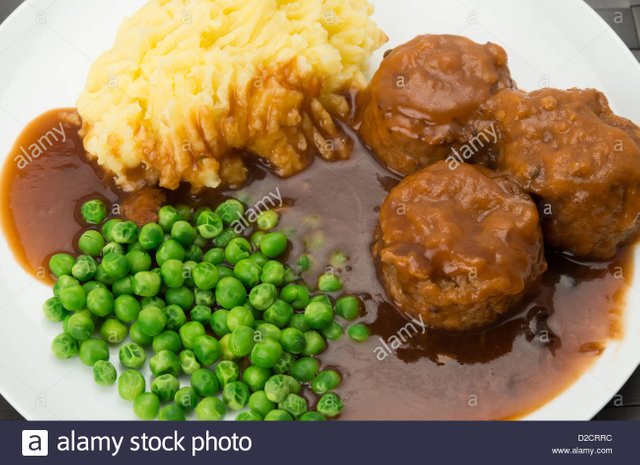 classic-british-dish-of-faggots-with-potato-mash-peas-and-gravy-a-D2CRRC.jpg