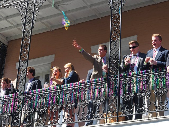 mardi-gras-throwing-beads-new-orleans.jpg