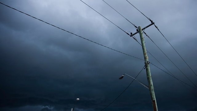 power-lines-storm-clouds-full-width-place.jpg