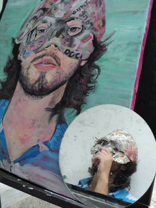 2012. Pintando el Autorretrato con el que gane el 2do lugar en el concurso de Pintura Rapida de la Universidad de Carabobo.jpg