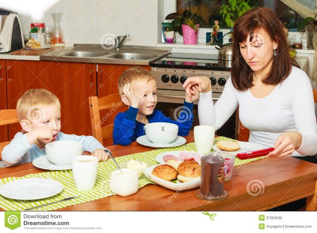 mother-sons-boys-kids-children-eating-breakfast-together-happy-family-blond-corn-flakes-bread-morning-meal-table-37064592.jpg