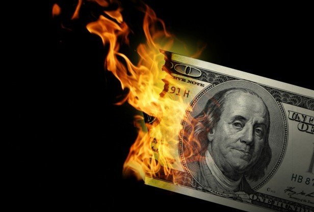 burning-money-e1340332352315.jpg