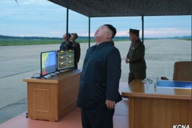 Kim-Watching-Markets.jpg