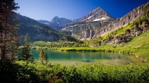 mountains_lake_grass_sky_summer_99494_300x168.jpg