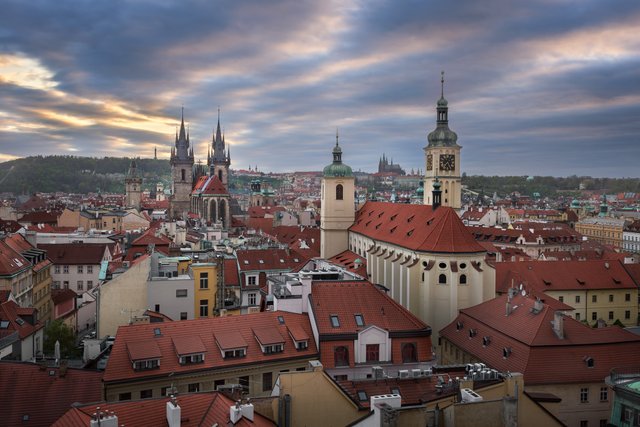 Aerial-View-of-Church-of-Our-Lady-before-Tyn-Old-Town-and-Prague-Castle-at-Sunset-Prague-Czech-Republic.jpg