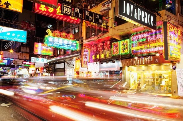 neon-signs-and-car-light-trail-in-tsim-sha-tsui-kowloon-hong-kong-BDEB0A.jpg