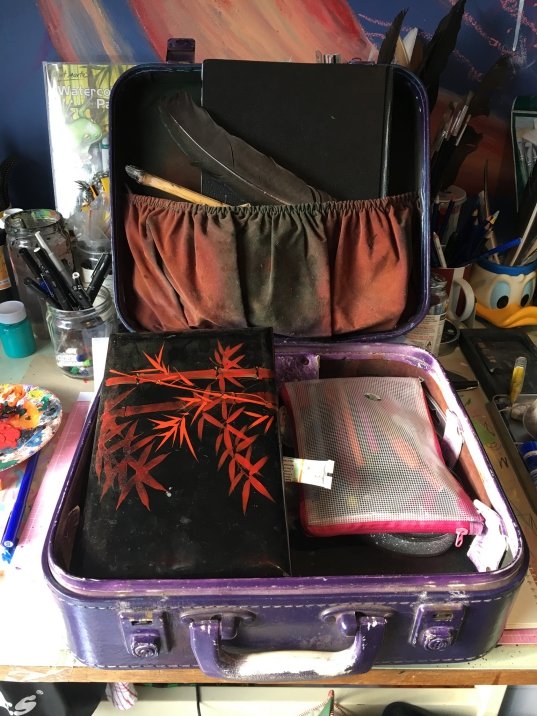 purple suit case.jpg