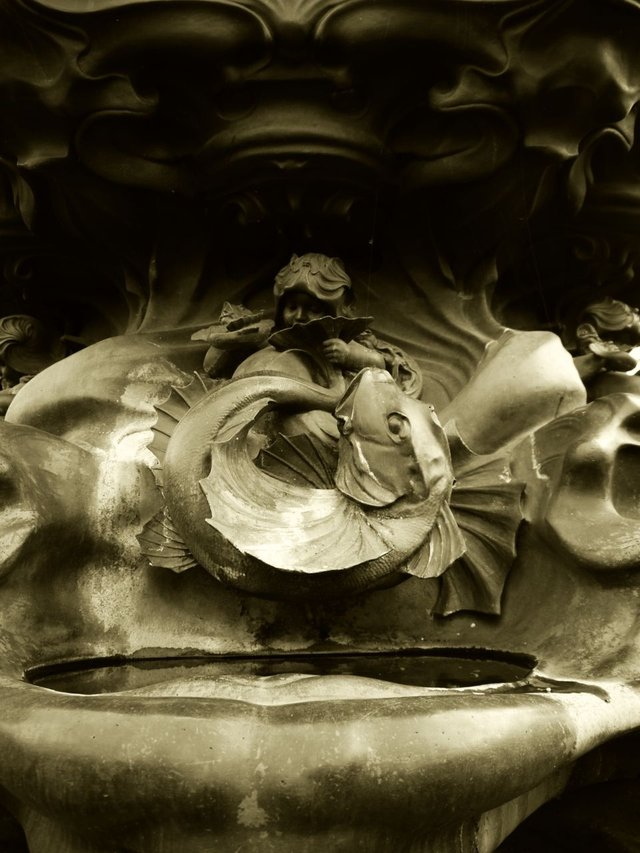 15569692735 - detail from the anteros statue in sefton park.jpg