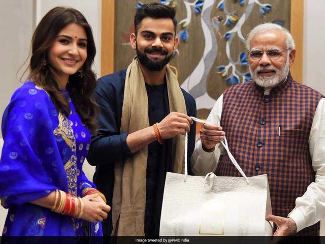 virat-kohli-anushka-sharma-narendra-modi_806x605_71513783174.jpg