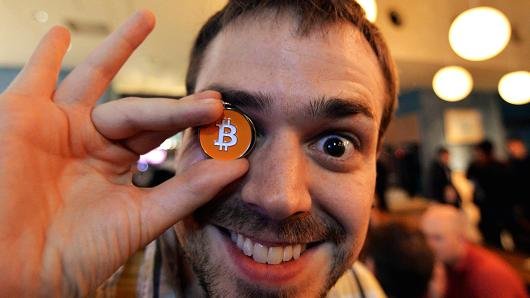 104495077-GettyImages-477039829-bitcoin.530x298.jpg