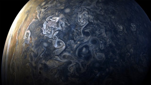 This is a photo of Jupiter that a robot took while flying at 130,000 mph.jpg